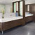 Photo of dark wood bath vanity cabinets by BKI Woodworks